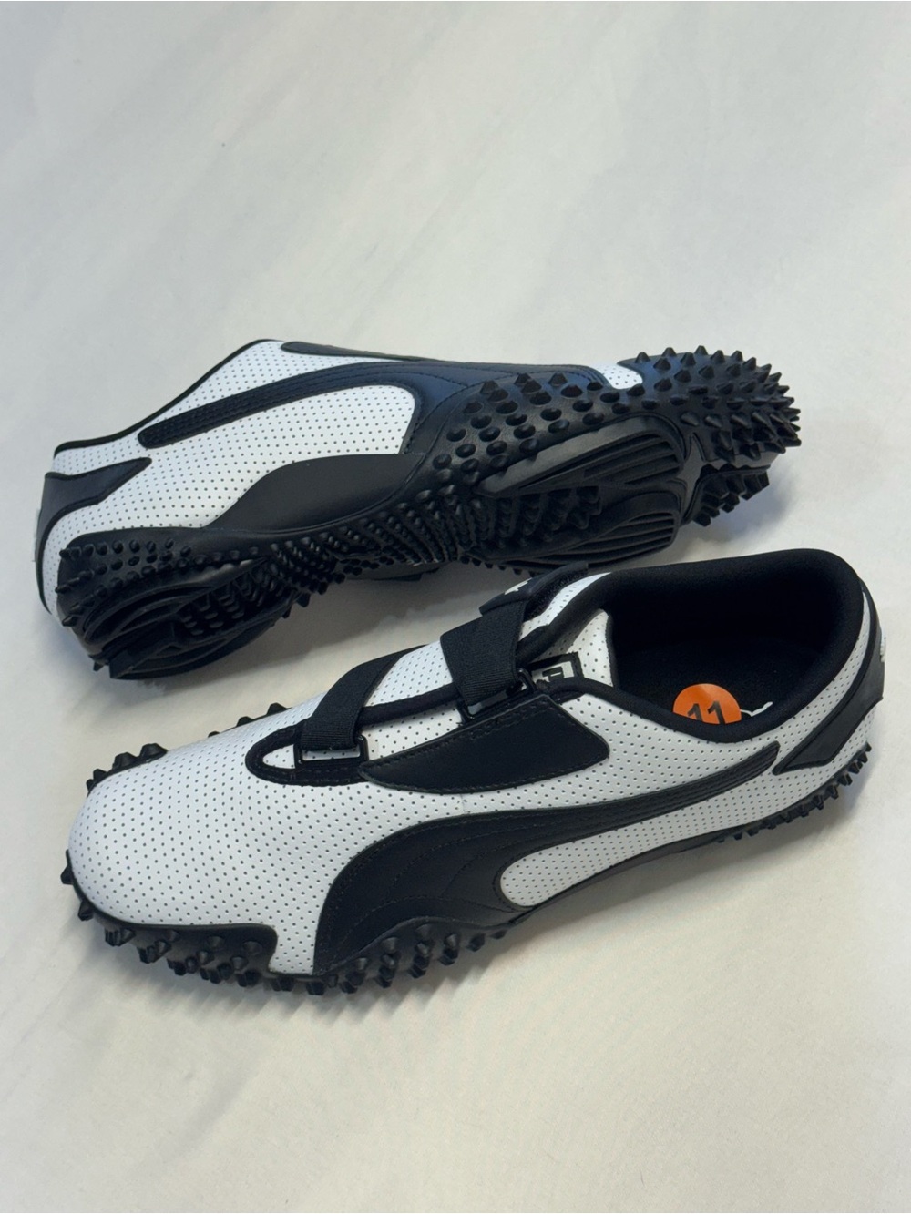 Puma men’s size 11 Black and White Strap Sneakers